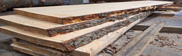 Stack Of Freshly Sawn Live Edge Slabs